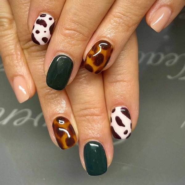 You don't need long nails to lean into the autumn season. Here, scroll through 20 short fall nail ideas that tap into everything we love about this time of year.