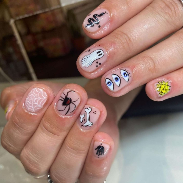 You don't need long nails to lean into the autumn season. Here, scroll through 20 short fall nail ideas that tap into everything we love about this time of year.