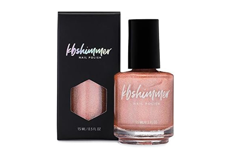 According to a beauty editor, Kbshimmer’s Stop and Smell the Rosé holographic nail polish lasts 18 days. Shop it for $12 on Amazon.