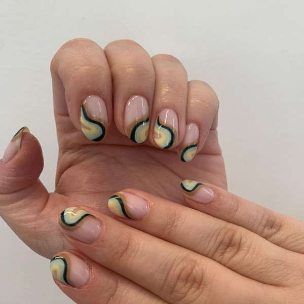 From earthy swirls to clean French manicures, here are 20 manicures that are perfect to wear during Virgo season.