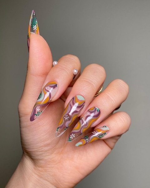 From graphic patterns to jewelry-like embellishments, here are 60 of the most stunning manicures for fall.