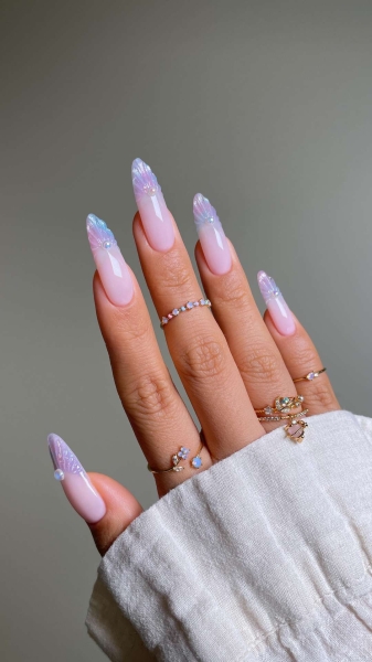 From graphic patterns to jewelry-like embellishments, here are 60 of the most stunning manicures for fall.