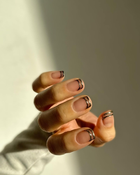 From graphic patterns to jewelry-like embellishments, here are 60 of the most stunning manicures for fall.