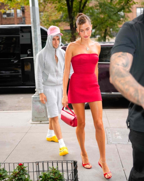 Hailey and Justin Bieber were spotted outside of their church wearing mismatching looks. See their outfits, here.