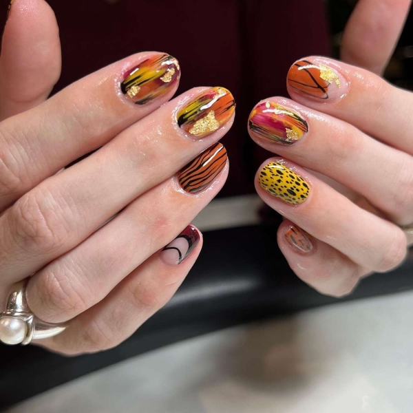 Pumpkin spice season has transcended the world of coffee to inspire fashion and beauty statements alike. Here, explore a bevy of pumpkin spice nail ideas for the most perfect fall mani.