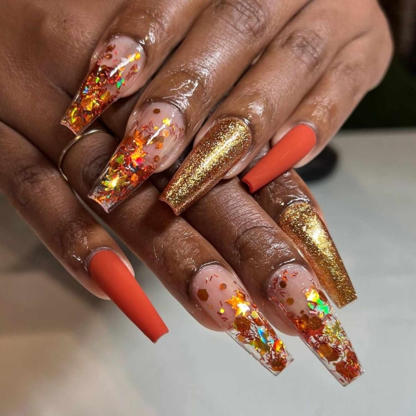 Pumpkin spice season has transcended the world of coffee to inspire fashion and beauty statements alike. Here, explore a bevy of pumpkin spice nail ideas for the most perfect fall mani.