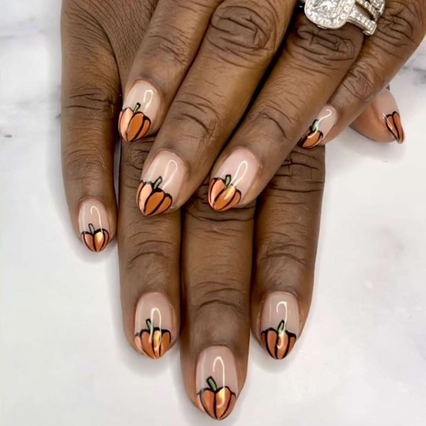 Pumpkin spice season has transcended the world of coffee to inspire fashion and beauty statements alike. Here, explore a bevy of pumpkin spice nail ideas for the most perfect fall mani.