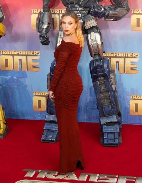 Scarlett Johansson attended the European premiere of 'Transformers One' in a rust-colored Saint Laurent gown that is so fall-coded. See the look here.