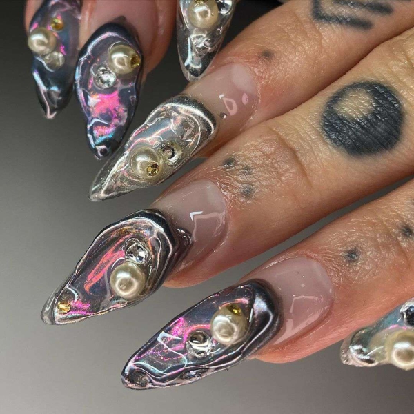 There is no shortage of designs available when you’ve got all three dimensions to work with—explore stunning 3D nail designs, here.