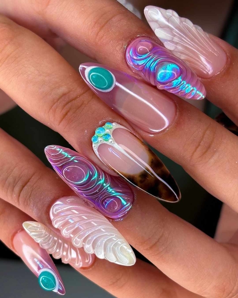 There is no shortage of designs available when you’ve got all three dimensions to work with—explore stunning 3D nail designs, here.