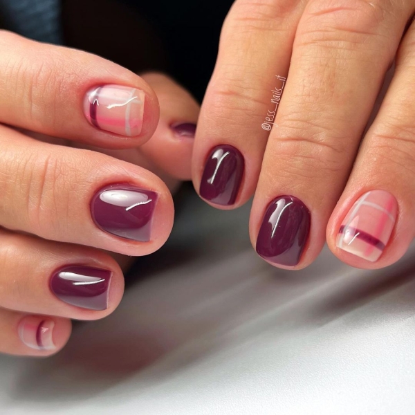 As fabulous as red wine looks in a glass, its color is even more stunning for a moody autumnal manicure. Here, scroll through 20 red wine nail looks perfect for fall.