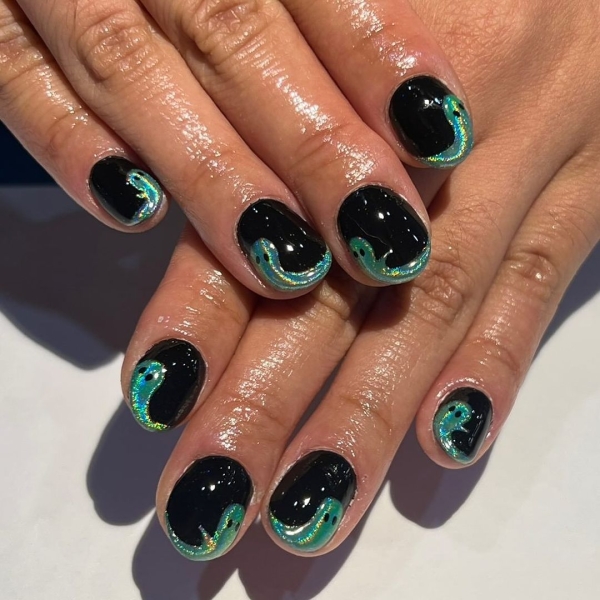 Just as the leaves change their colors, your nails might be due for a change as well. Here are 19 dark nail art designs to choose from.