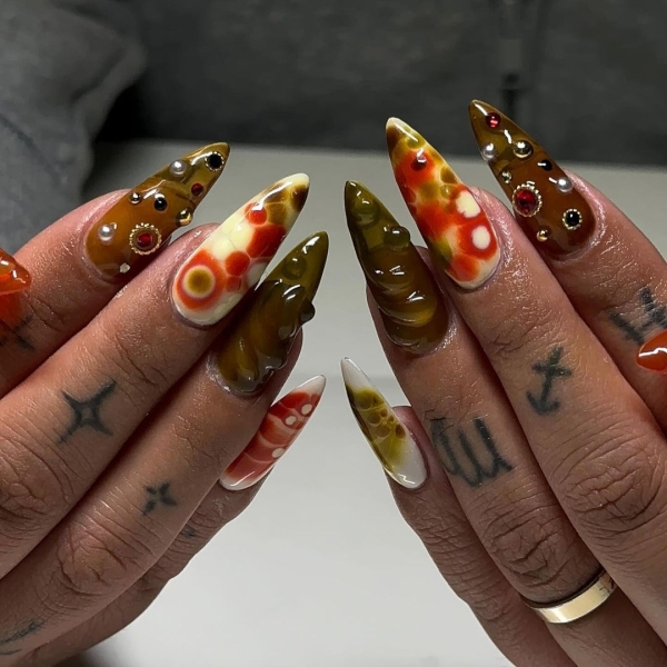 Just as the leaves change their colors, your nails might be due for a change as well. Here are 19 dark nail art designs to choose from.