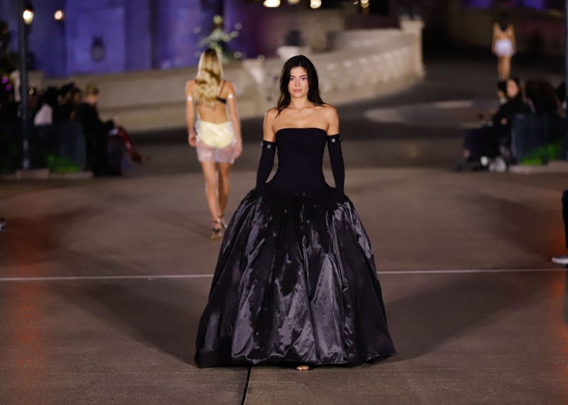 Kylie Jenner made her Paris Fashion Week runway debut at the Coperni show today at Disneyland Paris. See her all-black goth princess look, here.