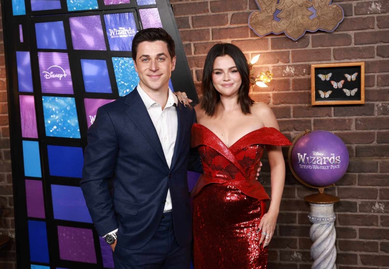 Selena Gomez wore a red Rodarte dress with a high slit to the premiere of 'Wizards Beyond Waverly Place' in Los Angeles. See her full look, here.