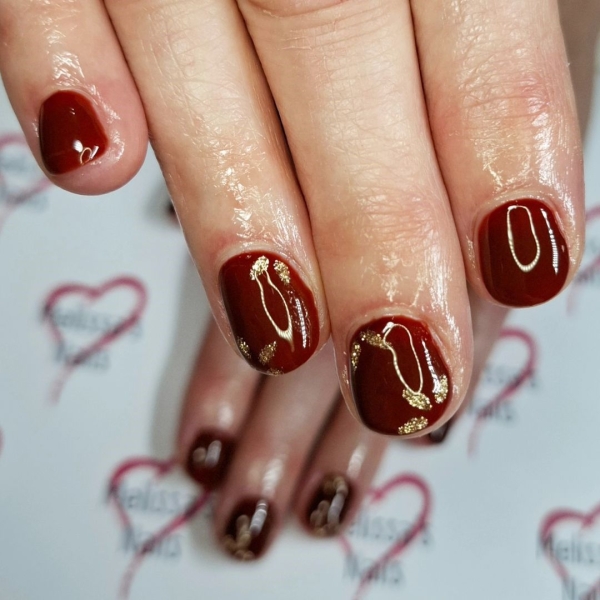 Cherry mocha is a dark and sultry shade that's inspired by deep reds and warm browns. See 15 manicures that make use of the warm hue.