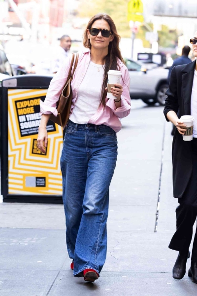 Katie Holmes stepped out in a boxy blazer and baggy, Gen-Z approved jeans. See her look, here.