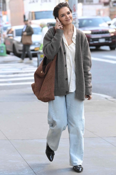 Katie Holmes wore a Kamala x Walz sweater during a sighting in New York City. See her perfect fall 'fit and voting fashion inspo, here.