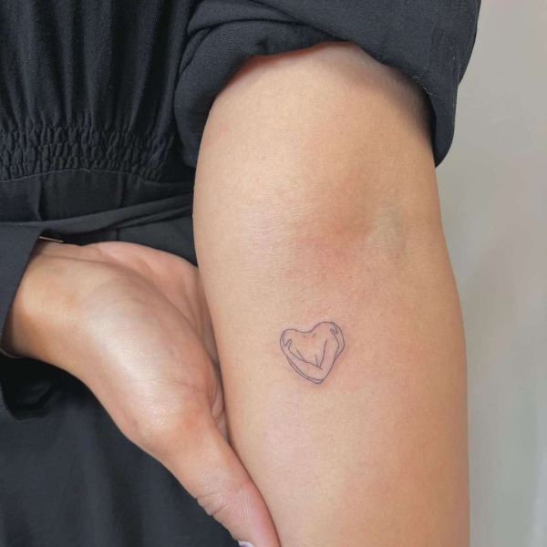 Looking to literally wear your heart on your sleeve with some body ink? Here, explore 25 heart tattoo ideas, ranging from black and white to bold pops of color.