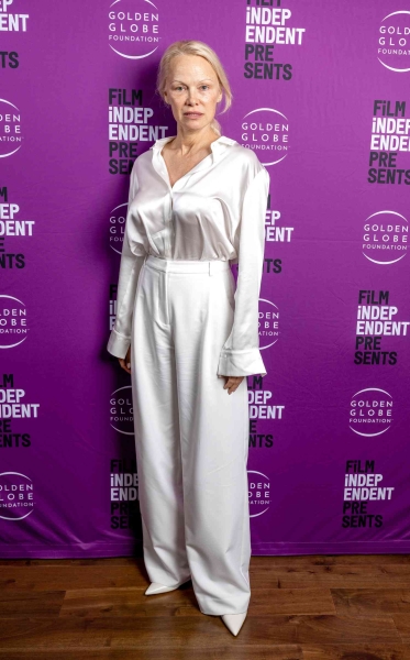 Pamela Anderson attended a screening of her upcoming film, 'The Last Showgirl' in her winter whites without makeup. See her look, here.