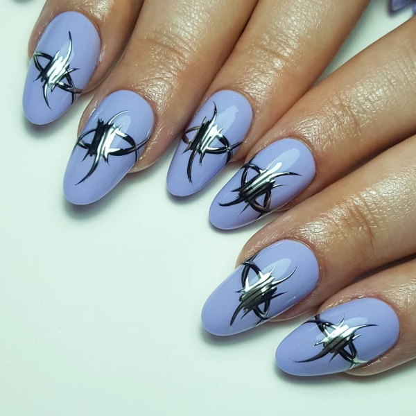 Scorpios are mysterious, passionate, magnetic, and ambitious. So to honor the sign through a manicure, the look should be anything but simple. Here are 20 befitting looks.