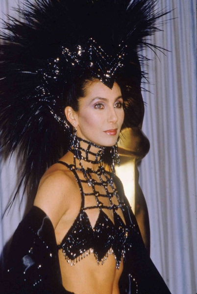 Cher explained her decision behind her wearing an ab-baring look by Bob Mackie to the 1986 Oscars in lieu of a traditional gown. See what she had to say, here.