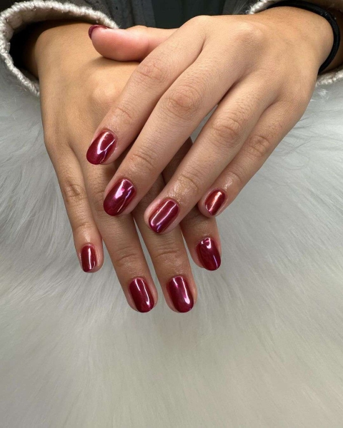 Few shades are as timeless as burgundy when it comes to fall and winter nail colors. This season, you can amplify its impact with a chrome effect, too. Scroll through 25 burgundy chrome nail looks for inspiration here.