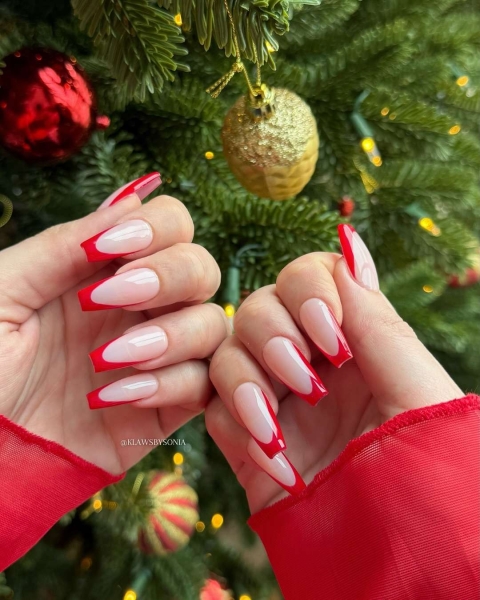 The color red is synonymous with Christmas and warm holiday cheer. Here, scroll through 18 red Christmas nail ideas for a festive touch this season.