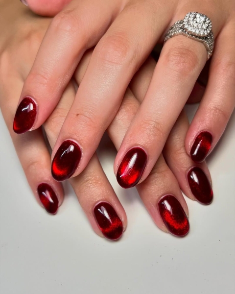 The color red is synonymous with Christmas and warm holiday cheer. Here, scroll through 18 red Christmas nail ideas for a festive touch this season.