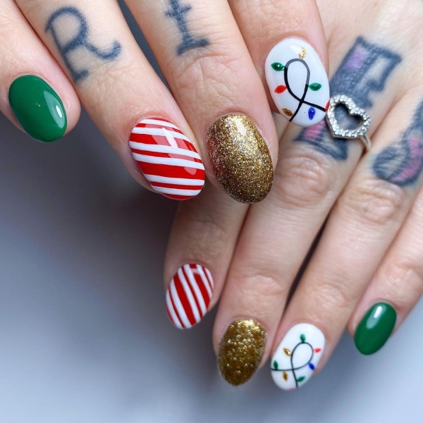 With holiday nail designs, you can lean into chunky glitters, fine shimmers, rich jewel tones, and festive motifs to keep a little piece of the holiday spirit right at your fingertips.