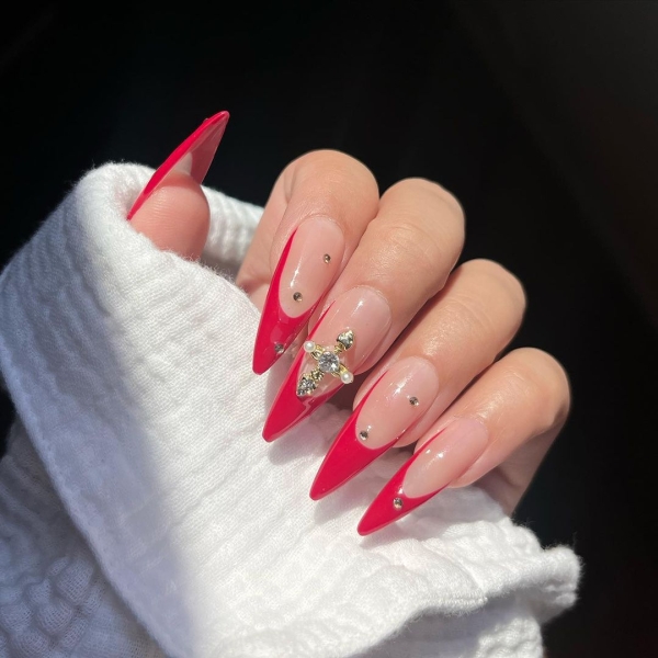 With holiday nail designs, you can lean into chunky glitters, fine shimmers, rich jewel tones, and festive motifs to keep a little piece of the holiday spirit right at your fingertips.