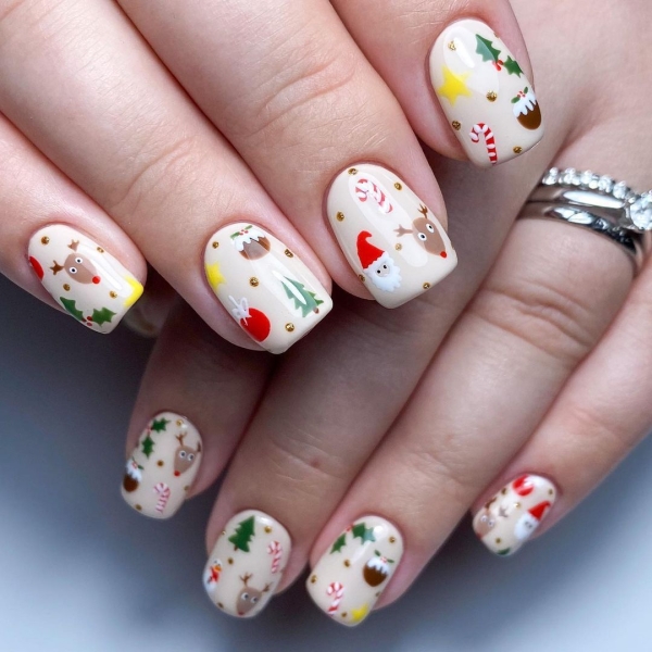 With holiday nail designs, you can lean into chunky glitters, fine shimmers, rich jewel tones, and festive motifs to keep a little piece of the holiday spirit right at your fingertips.