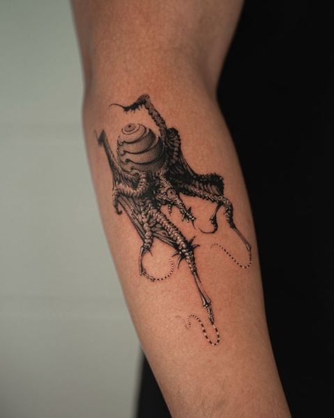 Yujhi: The Master of Surrealist Blackwork Tattoos