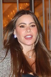 Brooke Shields wore a sleek silver power suit by Thom Browne with metallic stilettos and dangly earrings—and the cropped, tailored look totally bucked the oversized trend.