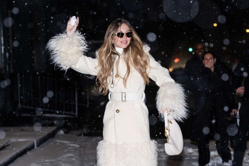 Sydney Sweeney embraced date night during a New York City blizzard by throwing snowballs while dressed in head-to-toe winter white on January 19. See her cozy outfit, here.