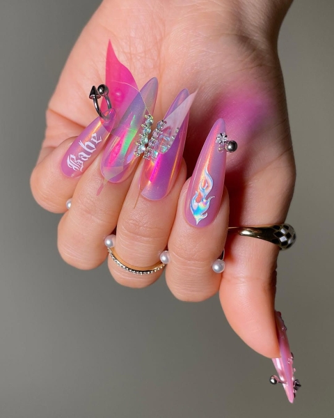 The early aughts were full of iconic beauty trends. In the nail art arena, square French manicures reigned supreme, alongside duck-shaped nails, animal prints and tattoo-inspired designs.