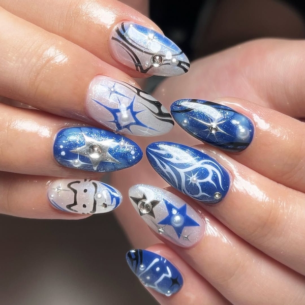 The early aughts were full of iconic beauty trends. In the nail art arena, square French manicures reigned supreme, alongside duck-shaped nails, animal prints and tattoo-inspired designs.