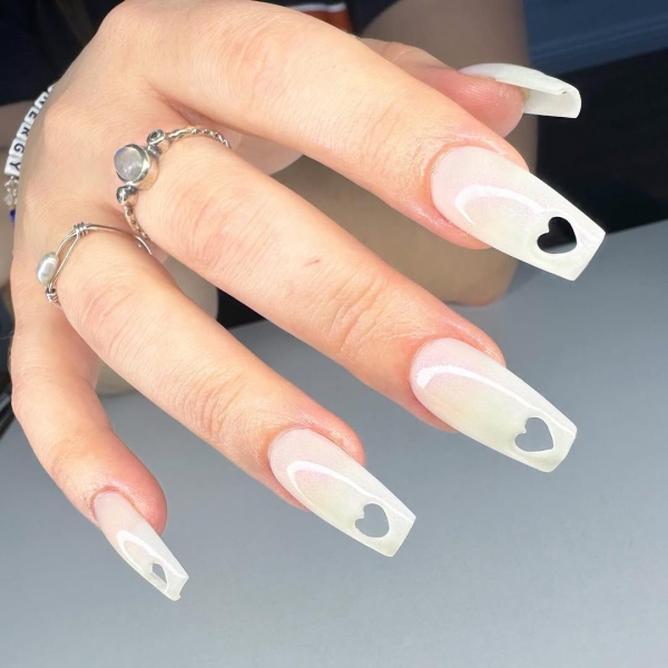 The early aughts were full of iconic beauty trends. In the nail art arena, square French manicures reigned supreme, alongside duck-shaped nails, animal prints and tattoo-inspired designs.