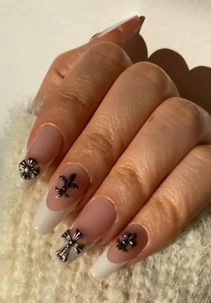 The early aughts were full of iconic beauty trends. In the nail art arena, square French manicures reigned supreme, alongside duck-shaped nails, animal prints and tattoo-inspired designs.