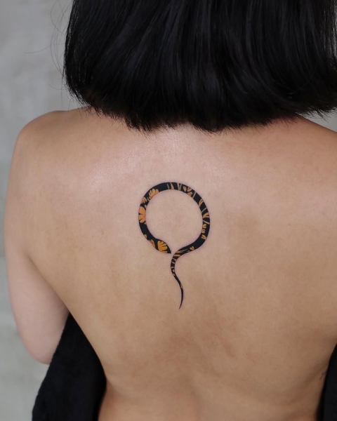 This Lunar New Year marks the Year of the Snake, and snake tattoos are coming in abundance. Here find inspiration from everything from minimalist serpent designs to bold pythons.