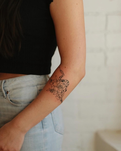 This Lunar New Year marks the Year of the Snake, and snake tattoos are coming in abundance. Here find inspiration from everything from minimalist serpent designs to bold pythons.