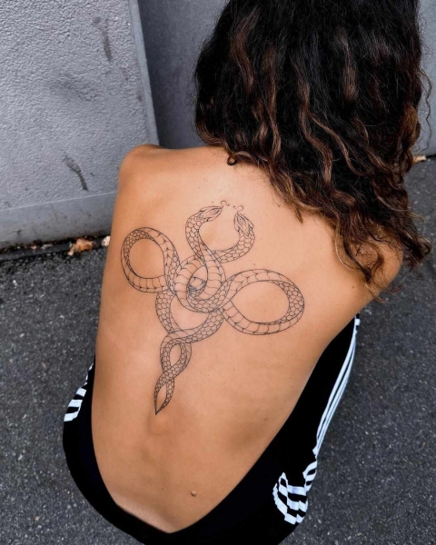 This Lunar New Year marks the Year of the Snake, and snake tattoos are coming in abundance. Here find inspiration from everything from minimalist serpent designs to bold pythons.