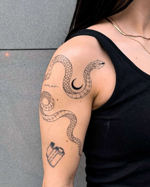 This Lunar New Year marks the Year of the Snake, and snake tattoos are coming in abundance. Here find inspiration from everything from minimalist serpent designs to bold pythons.