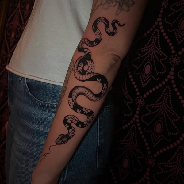 This Lunar New Year marks the Year of the Snake, and snake tattoos are coming in abundance. Here find inspiration from everything from minimalist serpent designs to bold pythons.