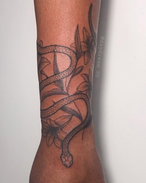 This Lunar New Year marks the Year of the Snake, and snake tattoos are coming in abundance. Here find inspiration from everything from minimalist serpent designs to bold pythons.