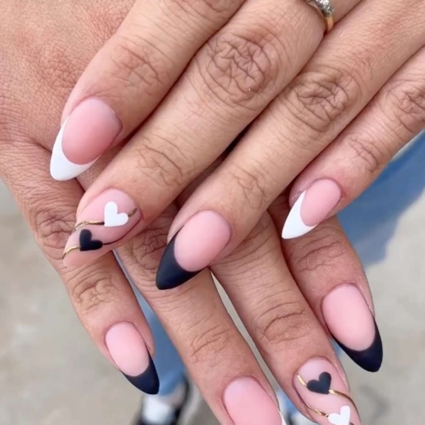 February is the month of love. Consider one of these pretty heart nail ideas to to add Valentine's Day vibes to your everyday look.