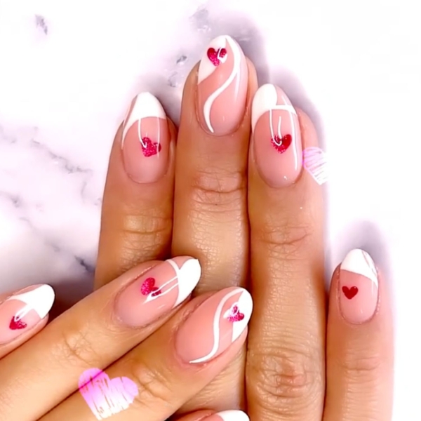 February is the month of love. Consider one of these pretty heart nail ideas to to add Valentine's Day vibes to your everyday look.