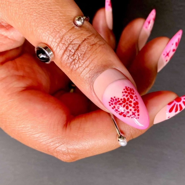 February is the month of love. Consider one of these pretty heart nail ideas to to add Valentine's Day vibes to your everyday look.