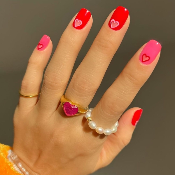 February is the month of love. Consider one of these pretty heart nail ideas to to add Valentine's Day vibes to your everyday look.