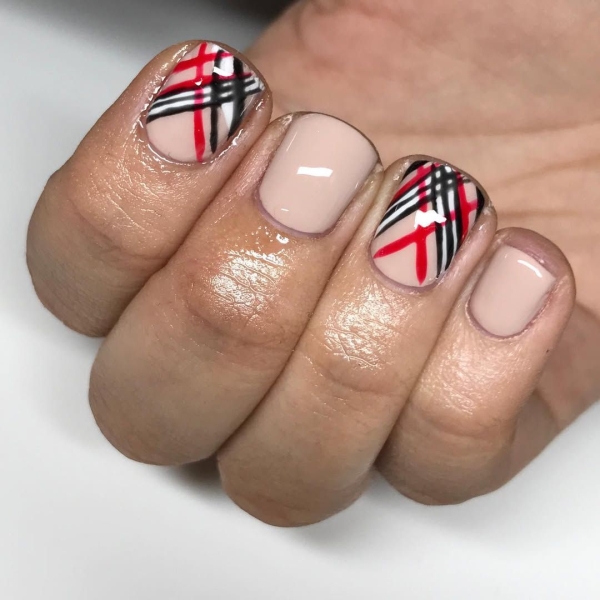 Sexy, warm, and versatile, red and black can turn any design into the perfect moody manicure. Browse 17 of our favorite combinations, here.